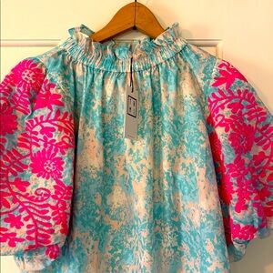 Adorable turquoise and fuschia women’s blouse